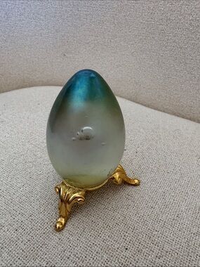 Decorative Gradient Blue-Green Glass Egg on Gold Stand